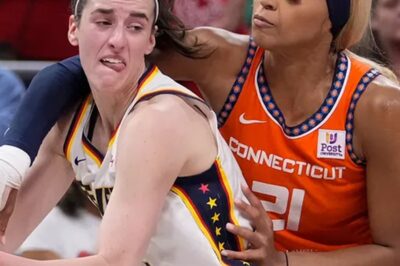 DiJonai Carrington Faces Possible Permanent Ban After Another Controversial Play Involving Caitlin Clark — Is the League Finally Stepping In?  The WNBA is on edge after yet another heated clash involving DiJonai Carrington and Caitlin Clark — and this time, the consequences may be career-ending. Following a string of on-court incidents and rising public backlash, insiders say league officials are considering the unthinkable: a permanent suspension. Is this justice… or is Carrington being made the face of a deeper, more explosive conflict brewing in women’s basketball?