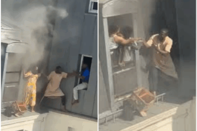 BLAZE RESCUE Dramatic moment hero caretaker rescues four babies from 6th-floor burning flat in Paris as he balances on narrow ledge