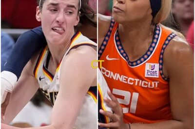 “She Reached For Her Eye — And The Arena Just Watched.” Instant Karma Hits DiJonai Carrington As REFs Finally Turn Their Backs — And What Caitlin Clark Did Next Shifted the Entire League. No whistle. No replay. No mercy. In that brutal moment, DiJonai Carrington went down. Clutching her face. Waiting for the same outrage she once weaponized against others. But all she got… was silence. For weeks, she turned every game into a dare. Eye pokes. Elbows. Grins at the refs. The league let it slide. The cameras looked away. Even when Caitlin Clark took the hits, nobody flinched. But this time, when DiJonai finally needed someone to step in — no one moved. Not the refs. Not her teammates. Not even the fans she thought were still on her side. The air went cold. Caitlin didn’t say a word. She didn’t need to. She turned. Walked. And for the first time all season, the internet saw something else behind her eyes: calculated restraint — and maybe, just maybe… satisfaction. What happened on that court isn’t just going viral. It’s splitting the league wide open. So what did Caitlin say — quietly, without the mic — that’s now echoing across locker rooms and headline calls? This moment didn’t just change the score. It shifted the balance.👇