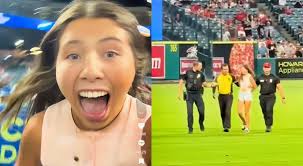 SHOCKING SCANDAL: Viral TikTok star faces jail time after recklessly storming the field during the Angels–Reds showdown, recording the entire wild stunt for millions online—leaving fans stunned, officials furious, and the sports world buzzing about the outrageous display.