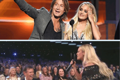 🚨 CARRIE UNDERWOOD LEFT SPEECHLESS — RANDY TRAVIS SHOCKS HER LIVE AT OPRY TRIBUTE! 😱🎤 Mid-performance, the legendary Randy Travis appeared out of nowhere, the audience went ballistic, and Carrie literally froze. Then, he dropped a bombshell that shook her to the core: she was invited to join the Opry family. Fans erupted. Tears, gasps, and chaos filled the room. This is a jaw-dropping moment the music world won’t stop talking about.